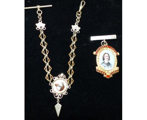 An American silvered metal watch chain with crystal fob; a silver gilt Masonic badge with enamelled portrait of Oliver Cromwe