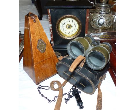 A black marble timepiece mantel clock; a mahogany metronome; a pair of binoculars; a police whistle; a meerschaum pipe (a.f.)