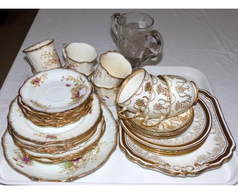 An early 20th century floral and gilt 19 piece tea service; a Paragon gilt part tea service; samovars