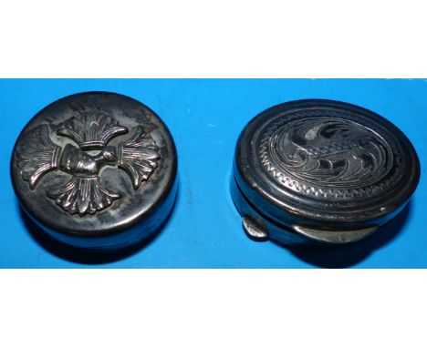 Two continental white metal patch boxes with chased/relief decoration to the lids