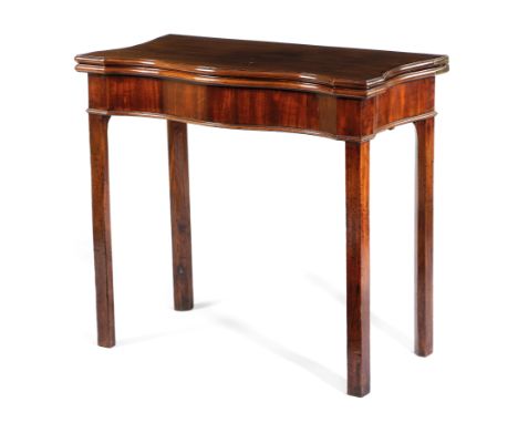 AN EARLY GEORGE III MAHOGANY SERPENTINE CARD TABLE C.1760 the fold-over top with a moulded edge revealing a baize lined inter