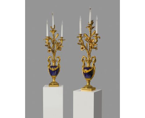 A PAIR OF FRENCH ORMOLU AND SEVRES PORCELAIN VASES AFTER THE MODEL BY PIERRE GOUTHIERE, SECOND HALF 19TH CENTURY each with a 