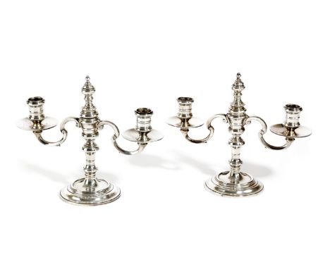 A PAIR OF GEORGE V SILVER DWARF TWIN-LIGHT CANDELABRA BY R. COMYNS, LONDON, 1936 with baluster columns and scroll branches, w