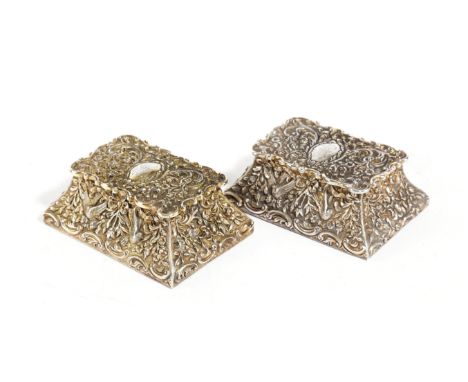 A PAIR OF EDWARDIAN SILVER-GILT DOUBLE STAMP BOXES BY J BATSON &amp; SON, LONDON 1901 of tapering rectangular form, heavily c