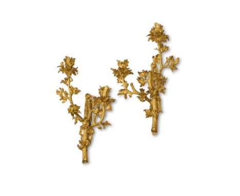 A RARE PAIR OF FRENCH ORMOLU TWIN-LIGHT WALL APPLIQUES IN LOUIS XV STYLE, SECOND QUARTER 19TH CENTURY naturalistically cast a