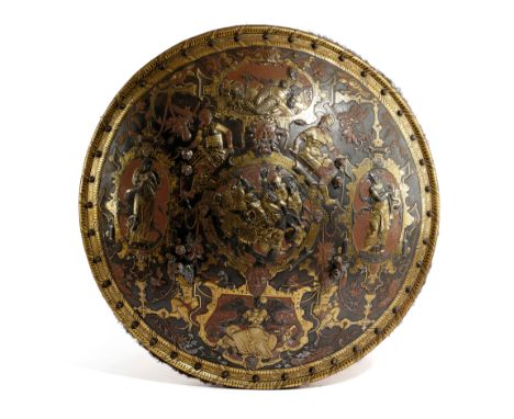 AN EMBOSSED AND GILDED STEEL COPY OF THE GHISI PARADE SHIELD IN RENAISSANCE STYLE, 19TH CENTURY of convex circular form, reli