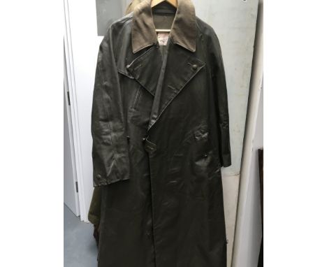 A German Third Reich full length Army waterproof coat and a British Royal Engineers coat (2)