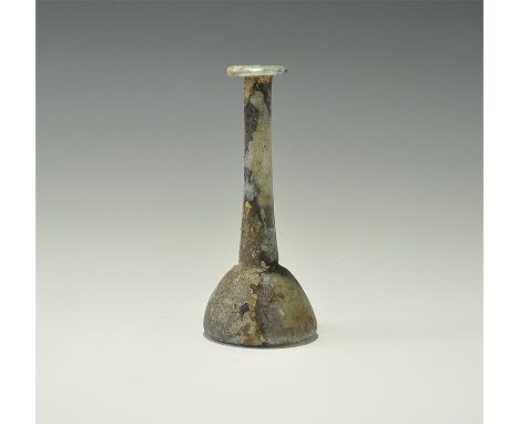 1st-3rd century AD. A domed glass body with concave base, slender tapering neck, applied rim. 48 grams, 16.5cm (6 1/2"). UK a