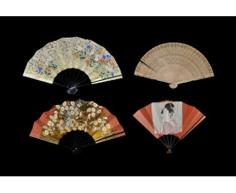 20th century AD. A group of four fans comprising: one wooden openwork folding fan with two pink fabric straps; one with black