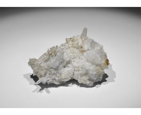 . A sheet of finely-formed quartz crystals with scalenohedral calcite overgrow. 110 grams, 78mm (3"). From a historic ‘Victor