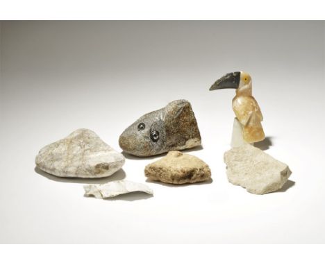 1st millennium BC and later. A mixed group of items comprising: a soapstone toucan figure; a marble cobble; a triangular terr