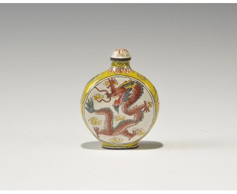 20th century AD. A white-glazed ceramic discoid bottle with advancing dragon design to both broad faces, domed lid; signed on