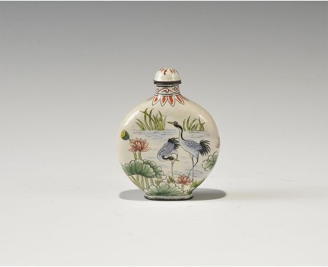 20th century AD. A white-glazed ceramic discoid bottle with waterfowl and vegetation design to both broad faces, domed lid; s
