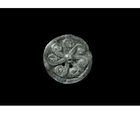 10th-11th century AD. A silver Scandinavian type pendant (also widespread in the historical Rus region), with central boss an