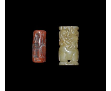 . A mixed group of cylinder seals comprising: one carnelian in the Old Babylonian Period (20th-16th century BC) style with sc