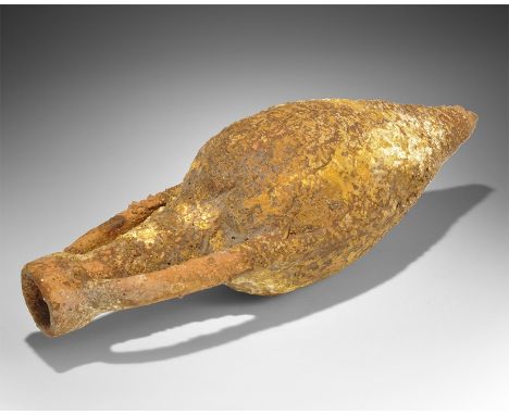 5th-3rd century BC. A small ceramic amphora with piriform body, tall neck, lateral flat-section handles; the surface covered 