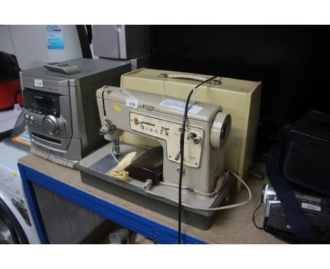 A Singer electric sewing machine sold as collectors item