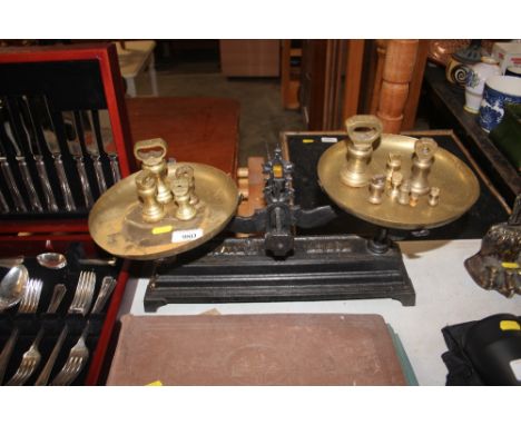 A set of kitchen scales and weights