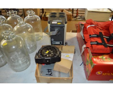 A twelve volt powered cool box; together with a boat compass etc