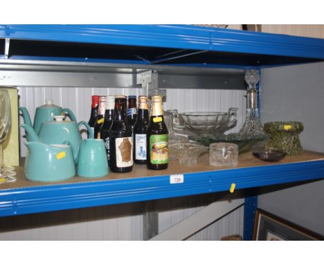 A quantity of glassware to include decanters and stoppers; pedestal bowl; various beers; tea set with Military mark to base