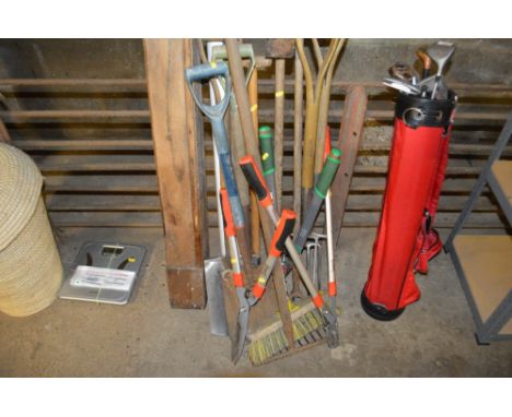 A quantity of long handled gardening tools
