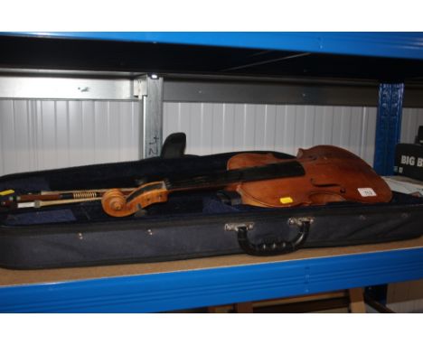 A replica Stradivarius violin in carrying case