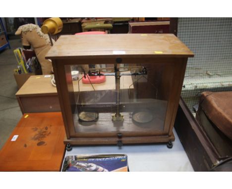 A cased set of chemist scales