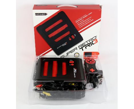 Retro-Bit Super Retro Trio 3 boxed console (PAL) This console is an adapter for Genesis, Super Nintendo (SNES) and NES games 