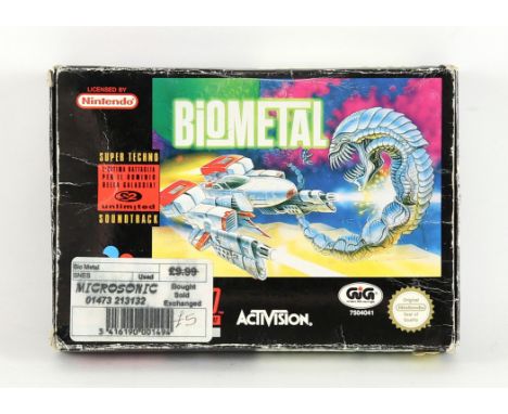 Super Nintendo (SNES) Biometal (PAL) Item is complete, boxed and has notable wear to its outer box There are pricing stickers