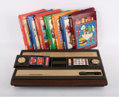 AMENDED DESCRIPTION Mattel Electronics Intellivision tabletop video game console with 7 games Games include: Las Vegas Roulet