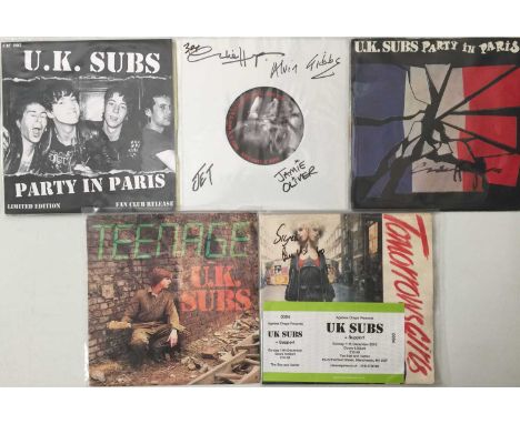 UK SUBS - SIGNED + FAN CLUB 7" PACK. A pack is 6 x 7". Titles are Party In Paris (single-sided, CAC 002, Ex), Party In Paris 