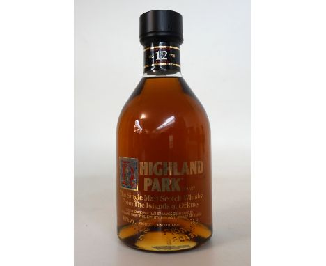 HIGHLAND PARK 12 YEAR OLD
A great older bottling of Highland Park 12 Year Old Single Malt Scotch Whisky with dumpy bottle and