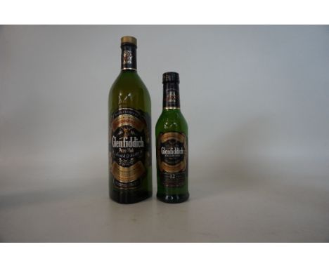 2 GLENFIDDICH SINGLE MALT
2 bottles.  Glenfiddich Special Old Reserve Pure Malt.  OB.  1 Litre.  86 Proof/ 43 G.L.  In a pres