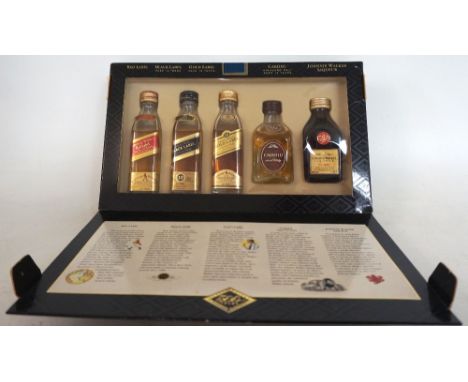 JOHNNIE WALKER SPECIAL COLLECTION - MINIATURES
A collection of 5 miniature bottles in a cardboard case.  Johnnie Walker Red L