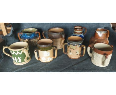 A collection of Doulton Lambeth Stoneware and associated Stoneware tygs and jugs, C1900 onwards. Harvest and Hunting scene de
