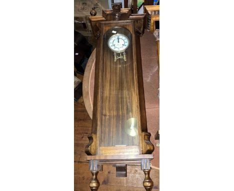 3. A modern Vienna style wall clock with 6" white dial. Two train weight driven movement with walnut style case. Dimensions 4