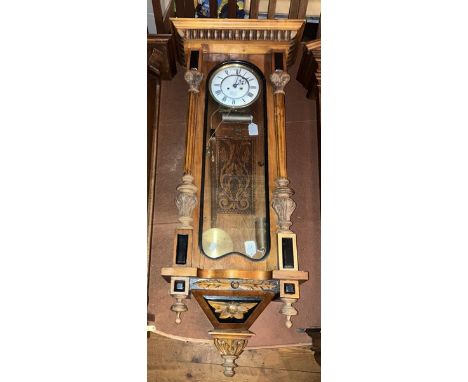 4. A Vienna wall clock with two train weight driven movement. Stamped Gaston Becker no 129858 has a two piece dial. Roman num