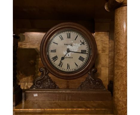 12. Davis of Hastings fusee gallery clock with 8 day single train movement. 12" dial spun base bezel contained in a mahogany 