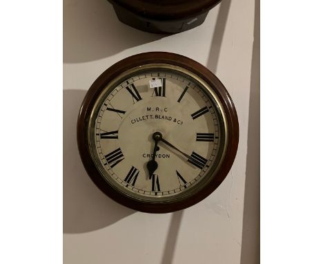 6. English fusee dial clock with a 12" dial with M.R.C CILLET BLAND & CO. Croydon written on the dial. Contained in a mahogan