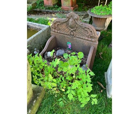 Modern metal plastic coated love seat white with some areas of rust (please see photographs) plus cast iron fire grate plante