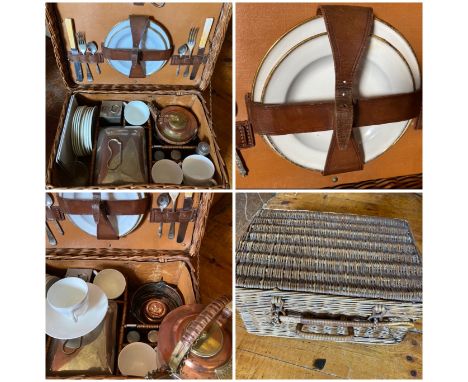 A vintage wicker picnic set containing a copper and brass spirit kettle, G W S and Sons. Coracle pot lunch box with metal lid