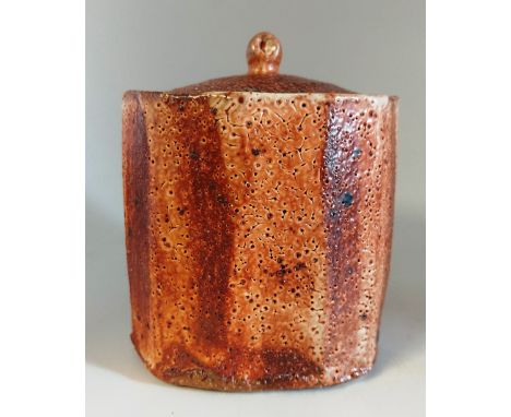 A Lisa Hammond (born 1956). Stoneware lidded tea caddy. with orange and brown glaze decoration. Impressed marks LH and Maze H