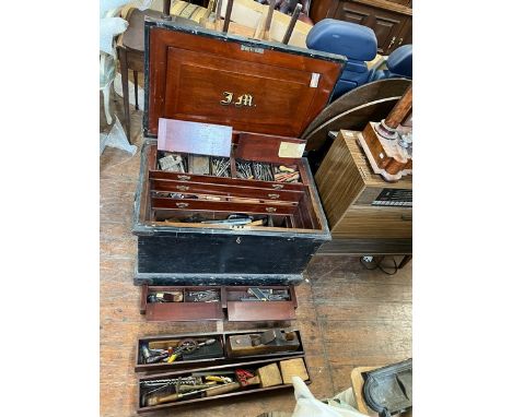 A seamans carpenters chest , Heavy duty black outer trunk containing a fully kitted out carpenters tool chest in Mahogany, mu