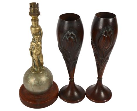 A pair of Garanti Villedieu Art Nouveau vases, 30cm, and a Continental table lamp supported by a figure of a lady on a globe 