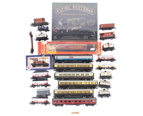 HORNBY - a quantity of loose Hornby carriages and goods wagons, a boxed Hornby Railways OO gauge R.416 operating mail coach, 