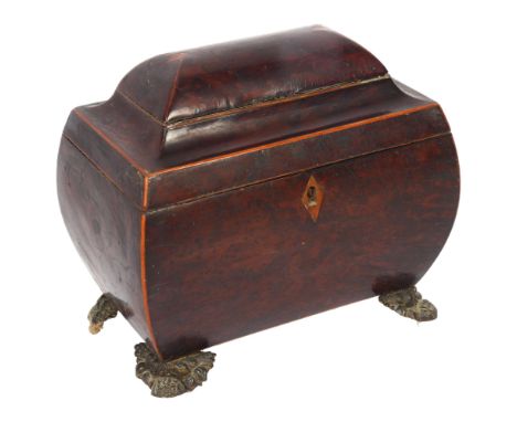 A walnut sarcophagus tea caddy, 2 inner fitted lids, on cast brass feet, W21cm 