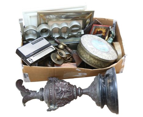 A group of various interesting items, including several modern wooden religious icons, a modern candlestick holder with mirro