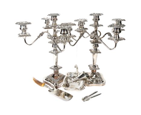 An impressive pair of silver plate on copper 4-branch table candelabras on single candlestick stands, H45cm, together with a 