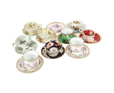 Victorian porcelain cabinet cups and saucers with painted decoration, a pair of Dresden cups and saucers, a Paragon cup and s