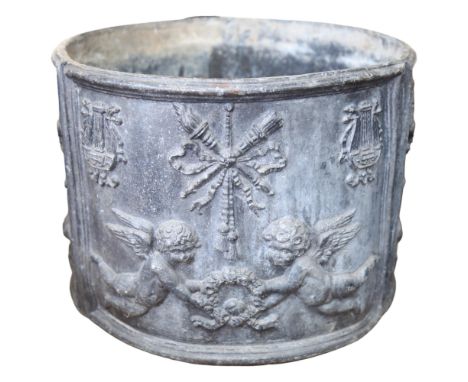 An embossed circular lead planter, with cherub decoration, diameter 34cm, height 25.5cm 